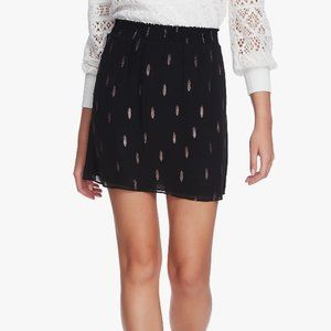 1. STATE Smocked Waist Foil Print Miniskirt